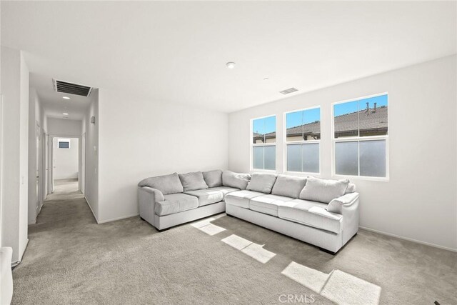 2333 S Via Esplanade Unit 25, Ontario, CA 91762 - living room featuring carpet