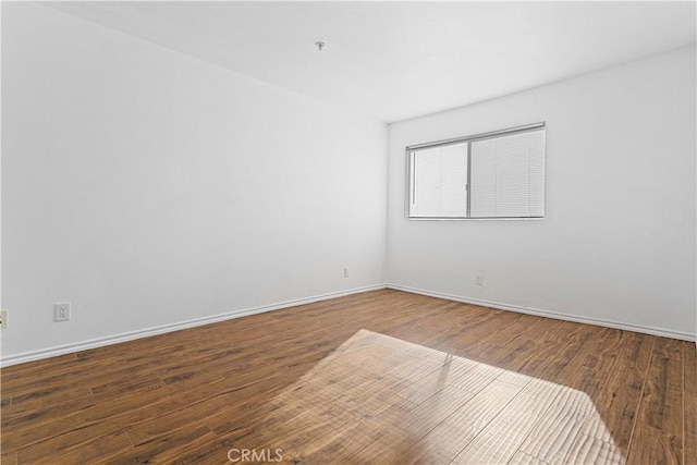 4511 Murietta Ave Unit 8, Sherman Oaks, CA 91423 - unfurnished room featuring wood finished floors, baseboards, and a pendent fire sprinkler