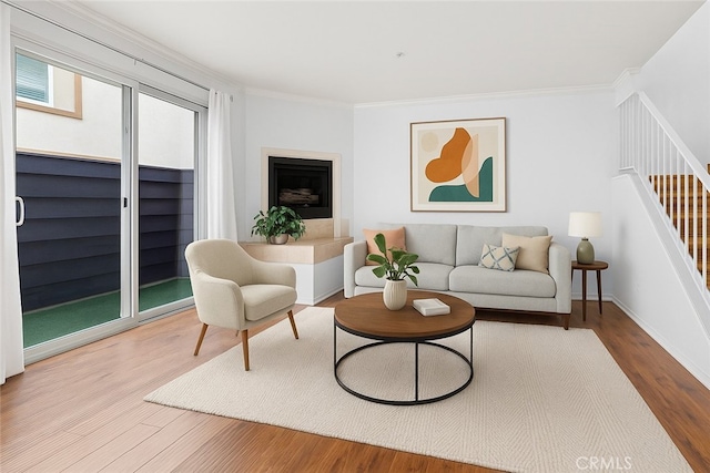 4511 Murietta Ave Unit 8, Sherman Oaks, CA 91423 - living area with ornamental molding, wood finished floors, stairs, and baseboards