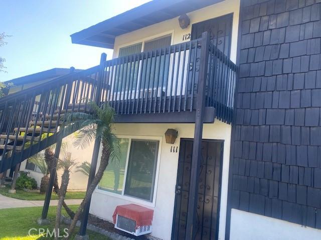 7100 Cerritos Ave Unit 112, Stanton, CA 90680 - view of property exterior with a balcony