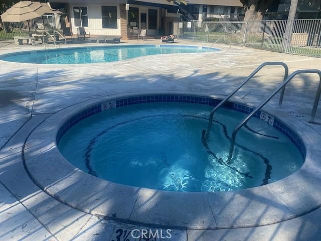 7100 Cerritos Ave Unit 112, Stanton, CA 90680 - community pool with a patio and a community hot tub