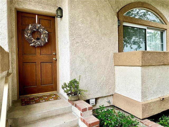 19950 Sherman Way Unit A, Winnetka, CA 91306 - view of exterior entry featuring stucco siding