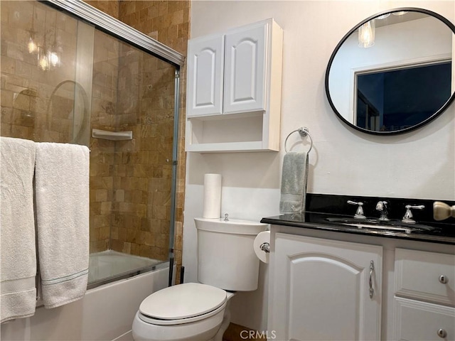 19950 Sherman Way Unit A, Winnetka, CA 91306 - bathroom with vanity, toilet, and enclosed tub / shower combo