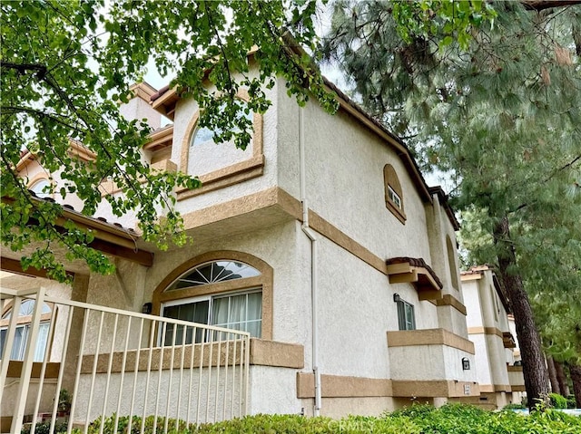 19950 Sherman Way Unit A, Winnetka, CA 91306 - view of property exterior featuring stucco siding