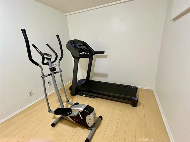19950 Sherman Way Unit A, Winnetka, CA 91306 - exercise area featuring wood finished floors and baseboards