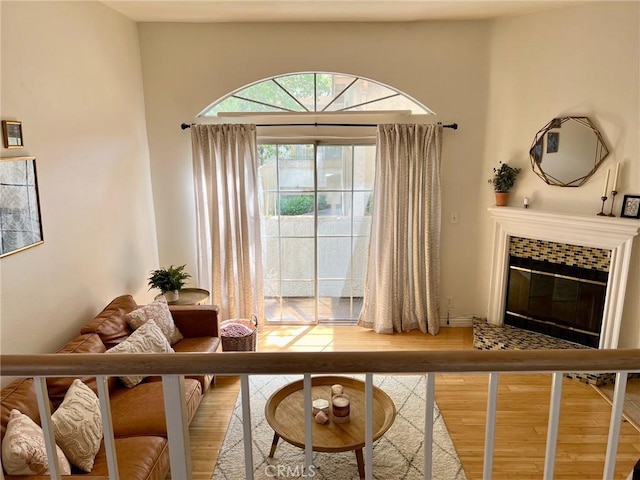 19950 Sherman Way Unit A, Winnetka, CA 91306 - living room with wood finished floors and a fireplace