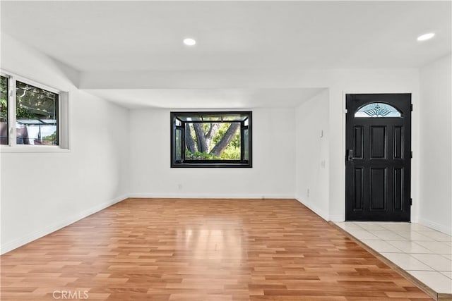 6172 Dalecrest Ave, Woodland Hills, CA 91367 - foyer featuring plenty of natural light, light wood-style flooring, recessed lighting, and baseboards