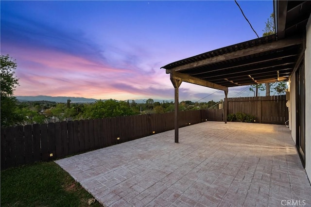 6172 Dalecrest Ave, Woodland Hills, CA 91367 - patio terrace at dusk featuring a patio and a carport