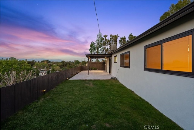 6172 Dalecrest Ave, Woodland Hills, CA 91367 - yard at dusk with a patio area