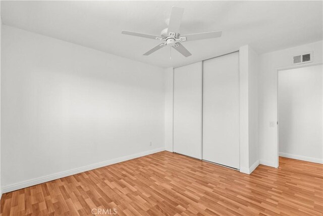 6172 Dalecrest Ave, Woodland Hills, CA 91367 - unfurnished bedroom with light wood-style flooring, baseboards, a closet, and ceiling fan