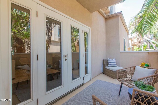 130 S Mentor Ave Unit 205, Pasadena, CA 91106 - property entrance featuring french doors and stucco siding