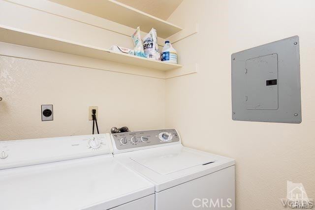 5805 Oak Bend Ln Unit 407, Oak Park, CA 91377 - laundry area featuring electric panel and washing machine and clothes dryer