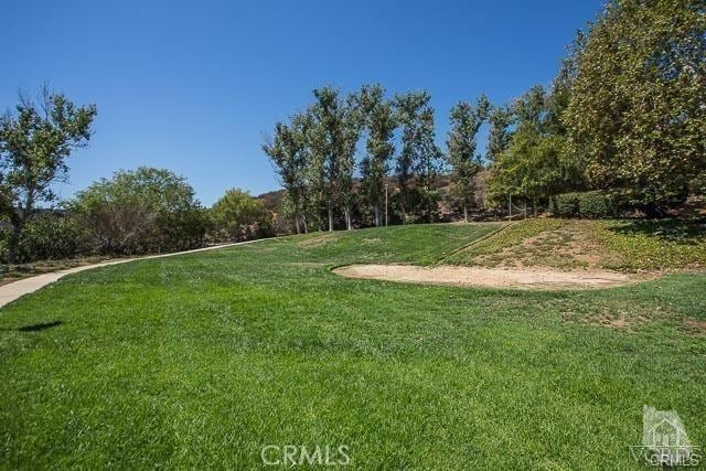 5805 Oak Bend Ln Unit 407, Oak Park, CA 91377 - view of community with a lawn