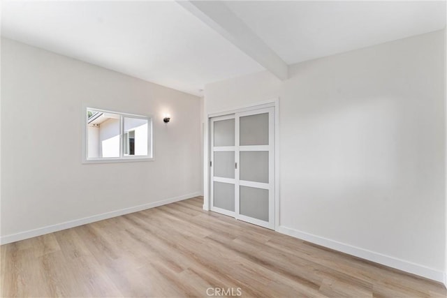 17924 E Kelby St, Covina, CA 91722 - empty room with light wood-type flooring and baseboards
