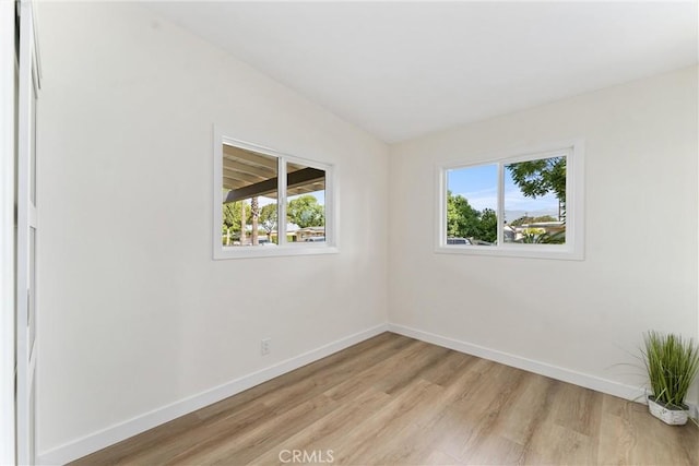 17924 E Kelby St, Covina, CA 91722 - unfurnished room with light wood-style floors and baseboards