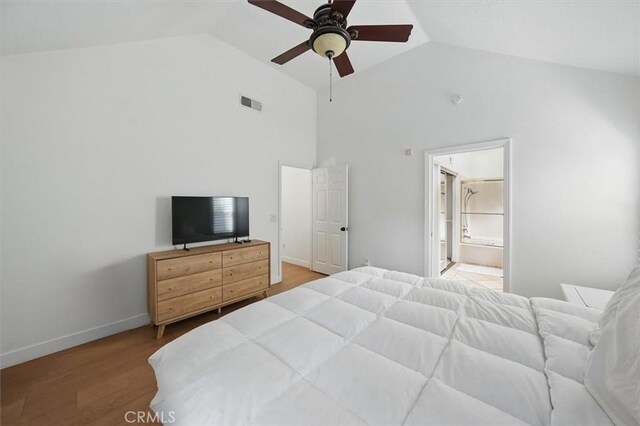 24148 Saint Moritz Dr, Valencia, CA 91355 - bedroom featuring high vaulted ceiling, light wood finished floors, connected bathroom, ceiling fan, and baseboards