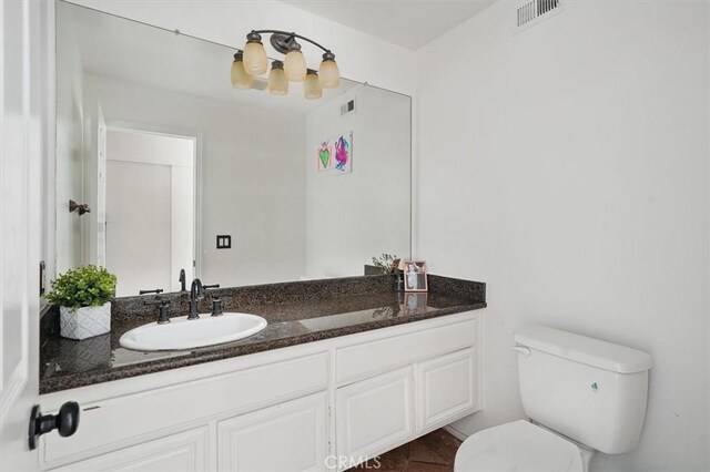 24148 Saint Moritz Dr, Valencia, CA 91355 - bathroom with toilet and vanity