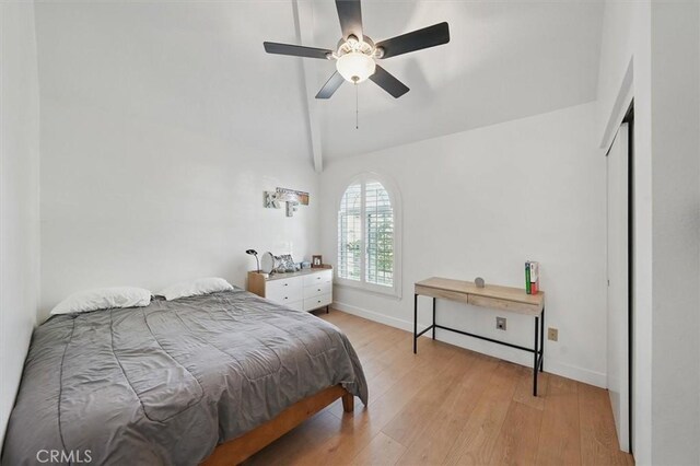 24148 Saint Moritz Dr, Valencia, CA 91355 - bedroom with light wood-style flooring, baseboards, ceiling fan, and a closet