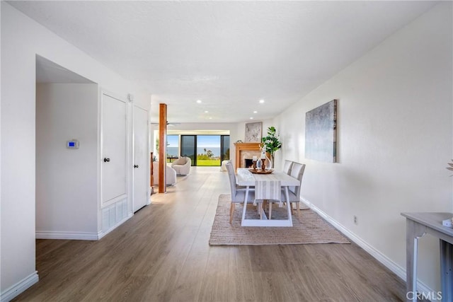 319 Calle Cuervo, San Clemente, CA 92672 - dining room with wood finished floors, baseboards, and recessed lighting