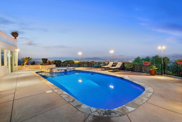 10310 Fuerte Dr, La Mesa, CA 91941 - pool at dusk with a patio and a pool with connected hot tub