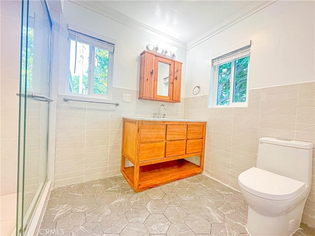 6275 Archibald Ave, Rancho Cucamonga, CA 91737 - bathroom featuring tile walls, crown molding, tile patterned flooring, toilet, and a stall shower