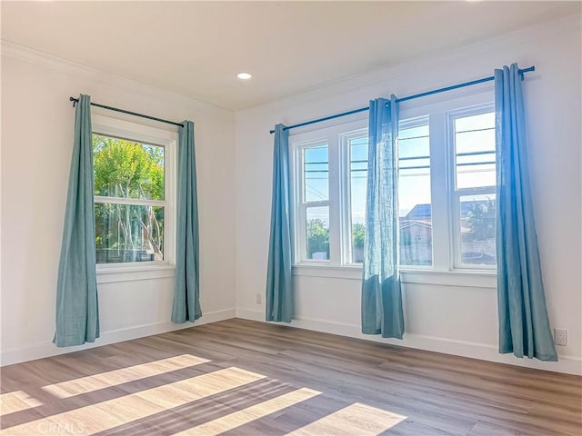 6275 Archibald Ave, Rancho Cucamonga, CA 91737 - unfurnished room with light wood-style floors, baseboards, ornamental molding, and recessed lighting