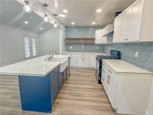 6275 Archibald Ave, Rancho Cucamonga, CA 91737 - kitchen with gas stove, light wood-type flooring, white cabinets, open shelves, and crown molding
