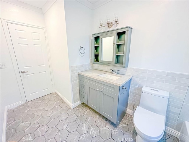 6275 Archibald Ave, Rancho Cucamonga, CA 91737 - bathroom with toilet, crown molding, tile walls, vanity, and tile patterned flooring