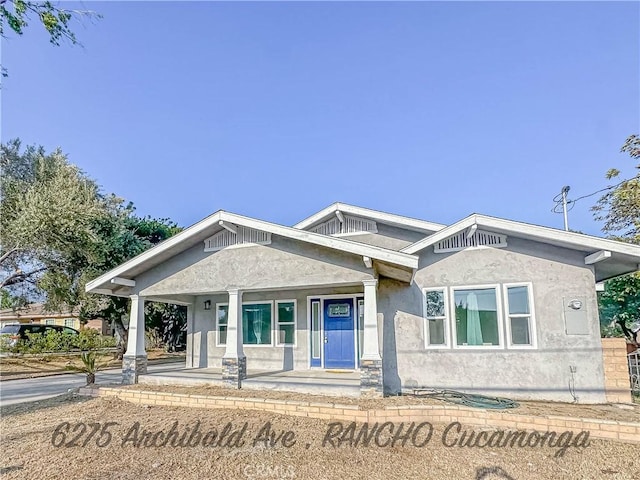 6275 Archibald Ave, Rancho Cucamonga, CA 91737 - view of front of home featuring covered porch and stucco siding