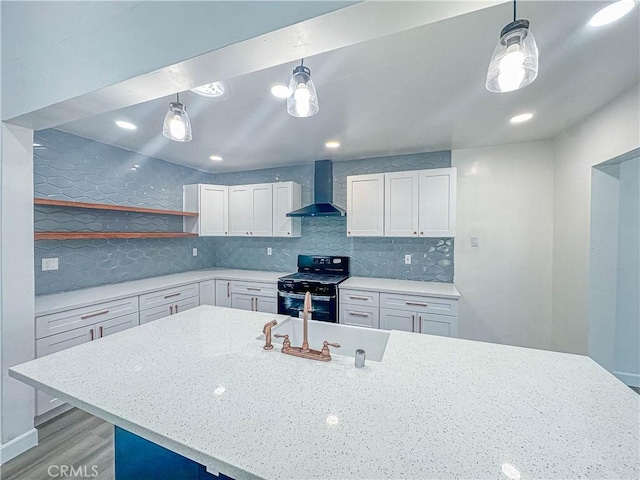 6275 Archibald Ave, Rancho Cucamonga, CA 91737 - kitchen featuring wall chimney exhaust hood, black gas stove, backsplash, a sink, and recessed lighting