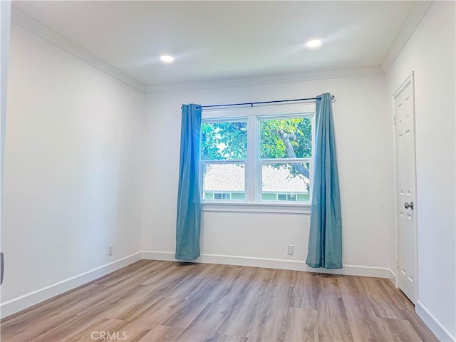 6275 Archibald Ave, Rancho Cucamonga, CA 91737 - spare room with ornamental molding, light wood finished floors, and baseboards