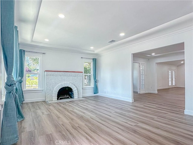 6275 Archibald Ave, Rancho Cucamonga, CA 91737 - unfurnished living room featuring baseboards, light wood-type flooring, a brick fireplace, crown molding, and recessed lighting