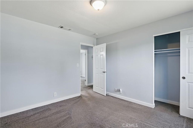 395 Columbia Ave, Merced, CA 95340 - unfurnished bedroom featuring carpet floors, baseboards, and a closet