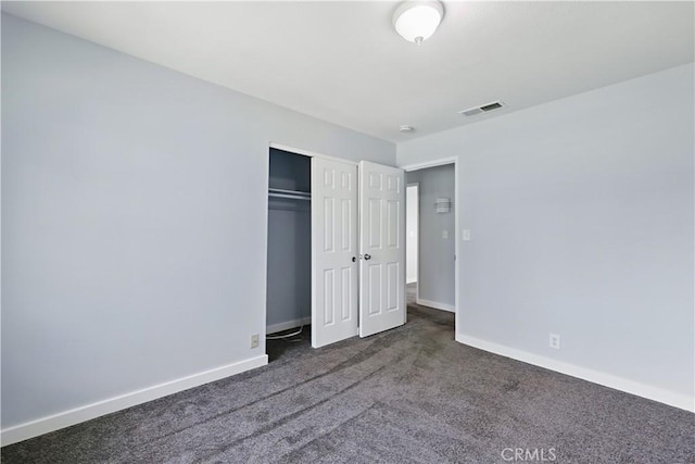 395 Columbia Ave, Merced, CA 95340 - unfurnished bedroom with carpet floors, baseboards, and a closet