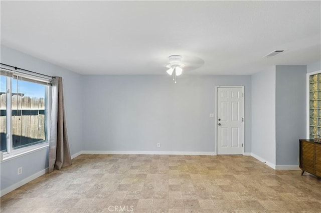 395 Columbia Ave, Merced, CA 95340 - spare room featuring ceiling fan and baseboards