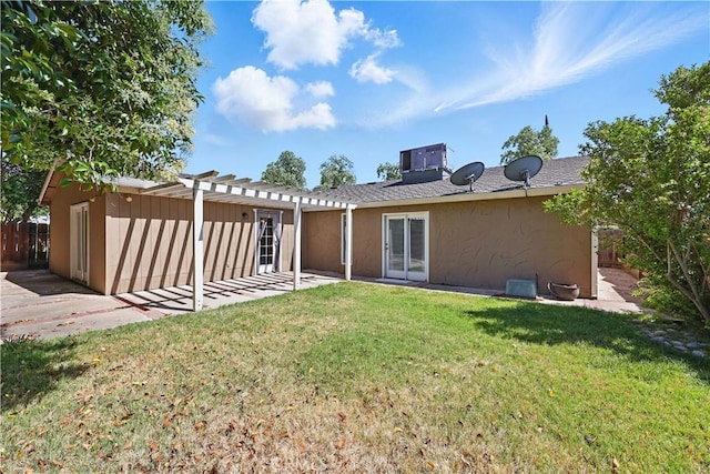 395 Columbia Ave, Merced, CA 95340 - back of house with a pergola, a patio, stucco siding, and cooling unit