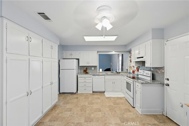 395 Columbia Ave, Merced, CA 95340 - kitchen with white appliances, a ceiling fan, tasteful backsplash, a sink, and white cabinetry