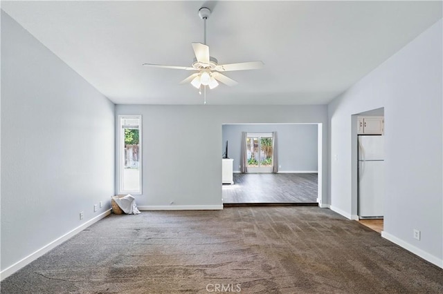 395 Columbia Ave, Merced, CA 95340 - carpeted spare room with plenty of natural light, ceiling fan, and baseboards
