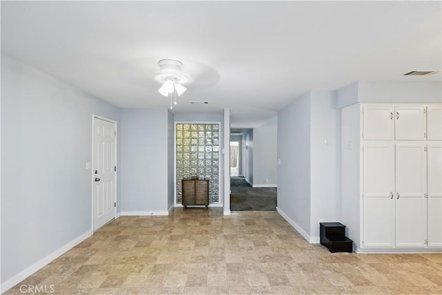 395 Columbia Ave, Merced, CA 95340 - empty room with a ceiling fan and baseboards