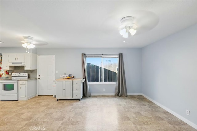 395 Columbia Ave, Merced, CA 95340 - kitchen featuring ceiling fan, electric range, under cabinet range hood, and light countertops