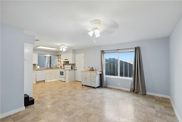 395 Columbia Ave, Merced, CA 95340 - living area with ceiling fan and baseboards