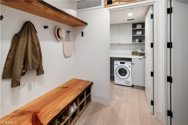 68 E F St, Encinitas, CA 92024 - washroom featuring washer / clothes dryer and cabinet space