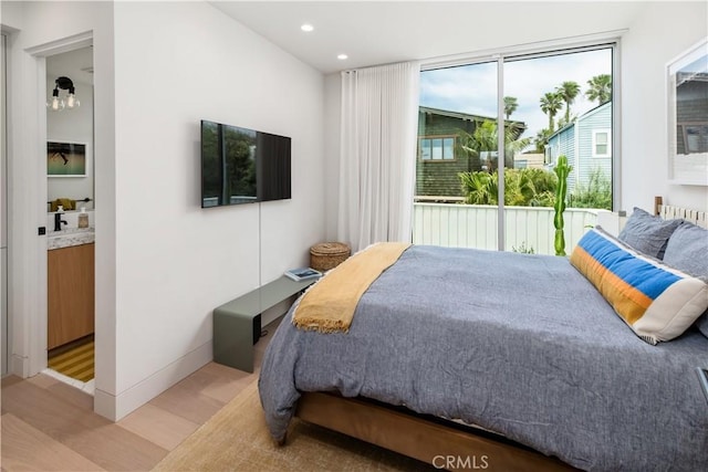 68 E F St, Encinitas, CA 92024 - bedroom with light wood-style flooring, access to exterior, and recessed lighting