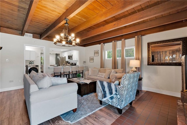 254 Piedmont Ave, Claremont, CA 91711 - living area featuring wooden ceiling with exposed beams, washer / clothes dryer, a chandelier, baseboards, and wood finished floors