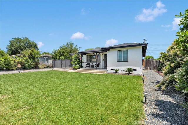 254 Piedmont Ave, Claremont, CA 91711 - view of front facade with stucco siding, crawl space, and a gate