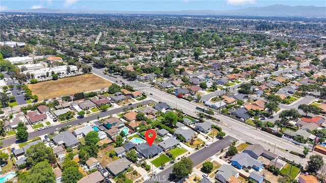 254 Piedmont Ave, Claremont, CA 91711 - aerial view of property and surrounding area featuring nearby suburban area and mountains
