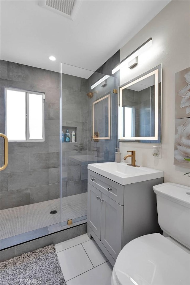 254 Piedmont Ave, Claremont, CA 91711 - bathroom featuring toilet, a stall shower, tile patterned flooring, and vanity