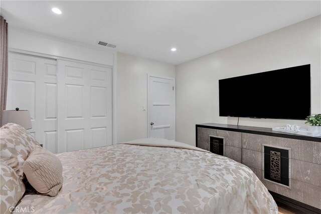 254 Piedmont Ave, Claremont, CA 91711 - bedroom featuring a closet, recessed lighting, and wood finished floors