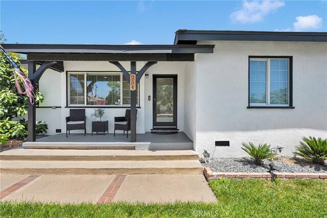 254 Piedmont Ave, Claremont, CA 91711 - view of exterior entry with covered porch and stucco siding