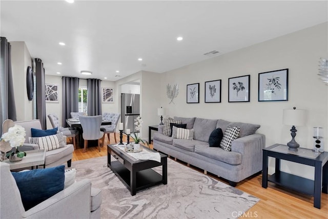254 Piedmont Ave, Claremont, CA 91711 - living room featuring light wood-style flooring and recessed lighting